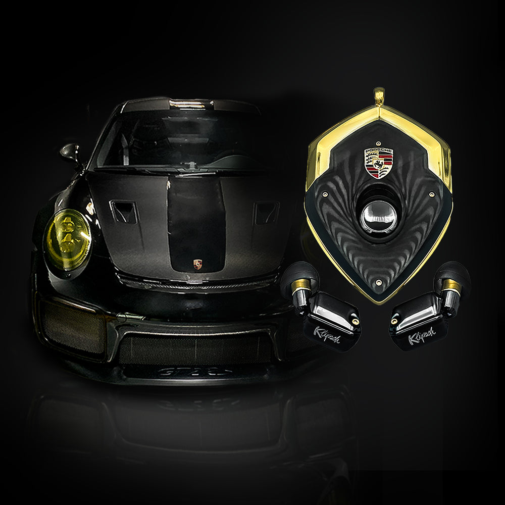 GT2-RS Porsche Tribute charging case with Porsche crest and gold frame beside a black GT2 RS