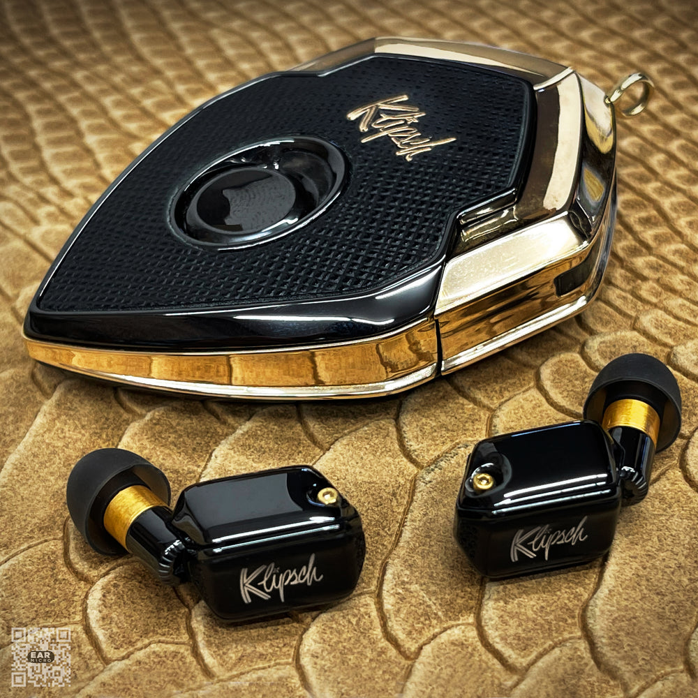 Apollo Bronze black leather charging case with polished bronze frame and black earbuds