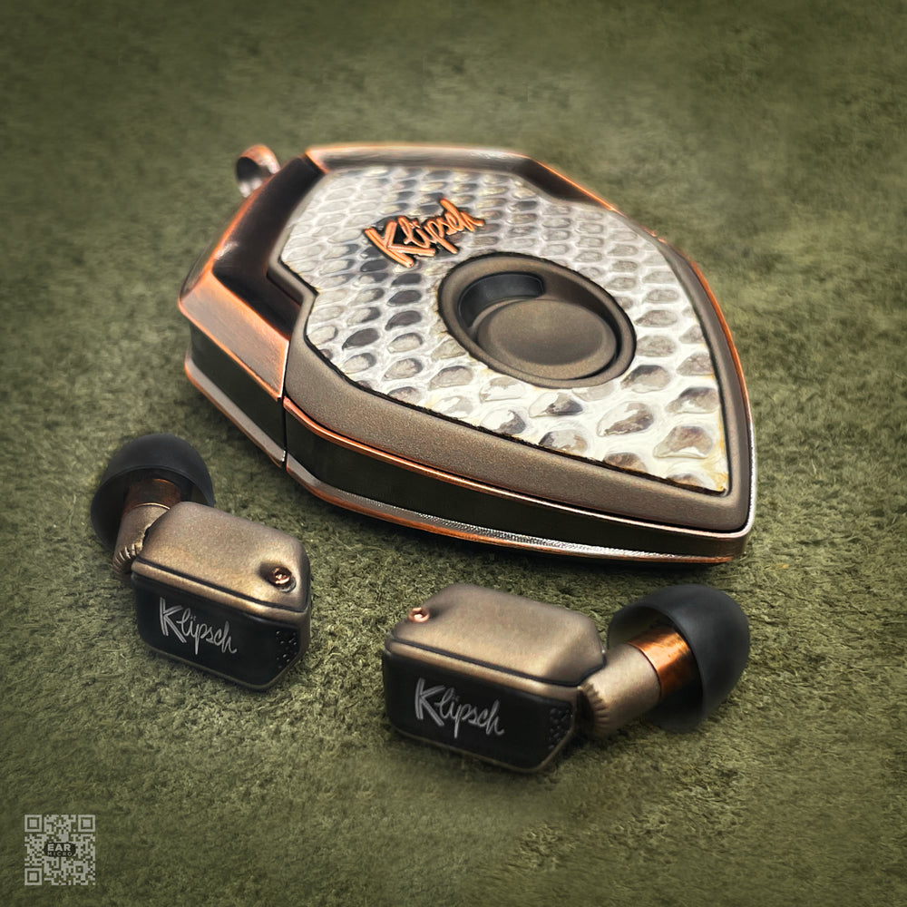 Venom of the Wild West case in python skin with aged copper frame and bronze earbuds