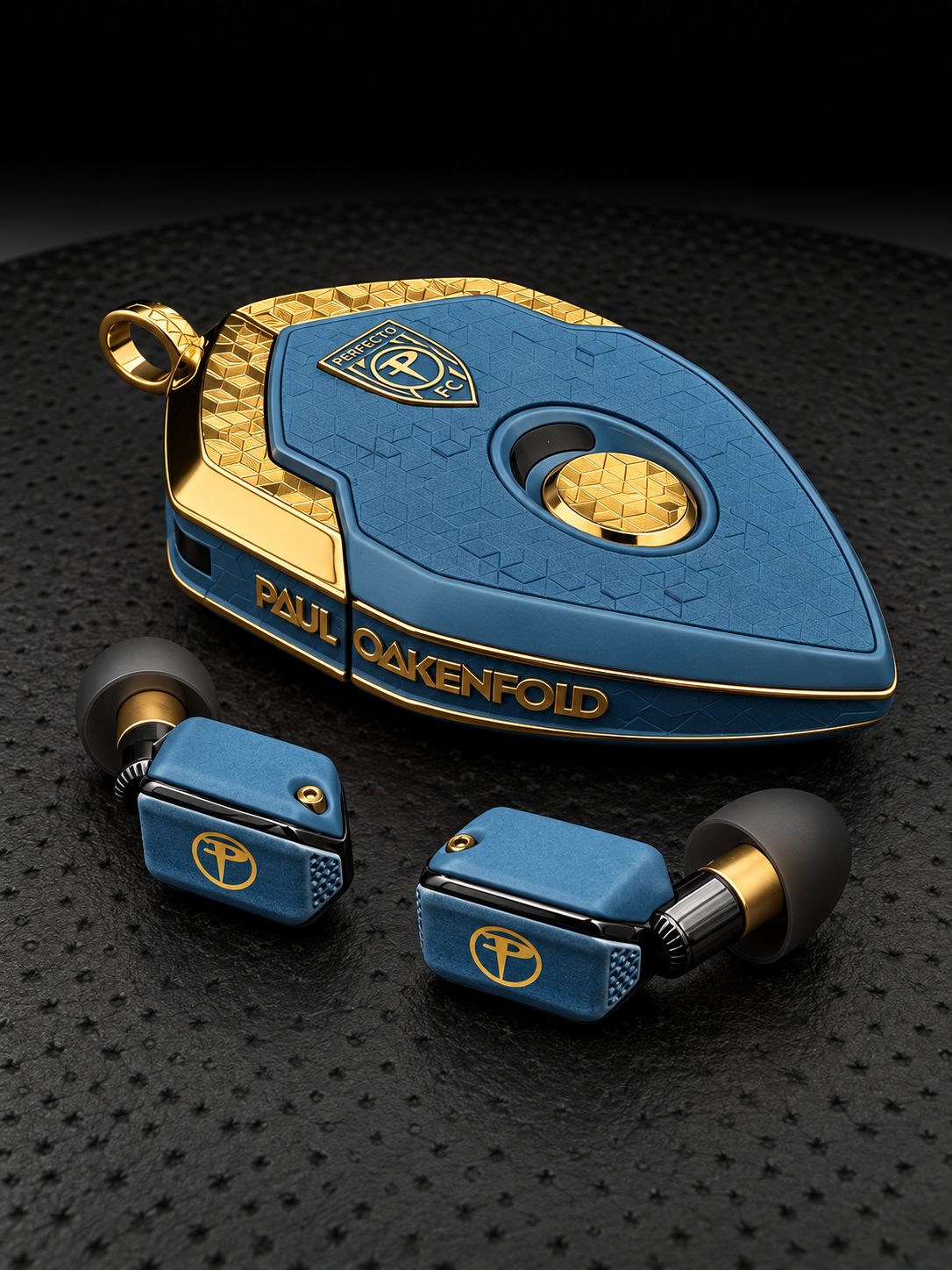 Paul Oakenfold commission: triple-plated gold charger with his name carved into the doors and frame, outlined in blue Cerakote