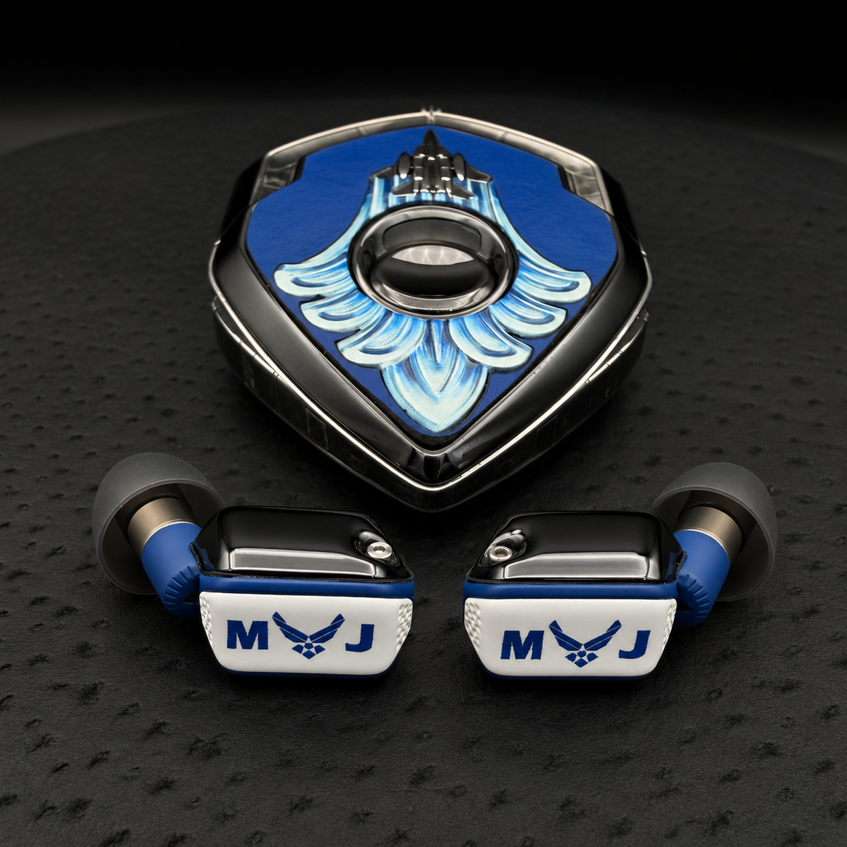 F-15 commission: ear computers Cerakoted deep navy blue with an Air Force emblem and initials on the antenna faces